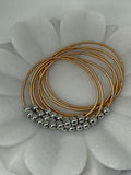 Boho Layered Spring Coil Guitar String Bracelet Set